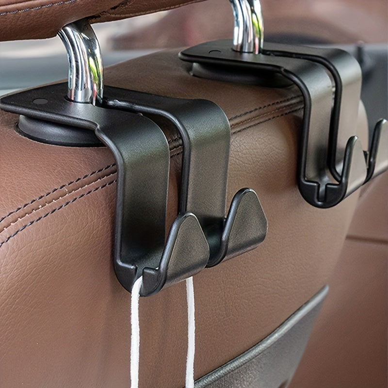 2 piezas de gancho multiusos para respaldo de asiento de coche - Gancho doble para almacenamiento de cinturones de seguridad, cojines de cabeza y accesorios, duradero plástico ABS negro, se adapta a la mayoría de los vehículos, organizador de cinturones