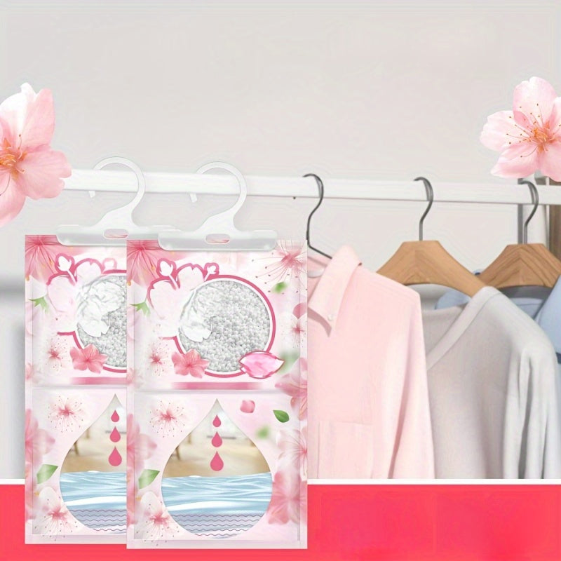 2/5 piezas de bolsas de deshumidificador estilo flor de cerezo, absorción de humedad y sequedad, adecuadas para dormitorio, sala de estar, cocina, baño, residencia, almacén, etc. - Bolsas de humedad colgantes para el hogar, deshumidificador portátil