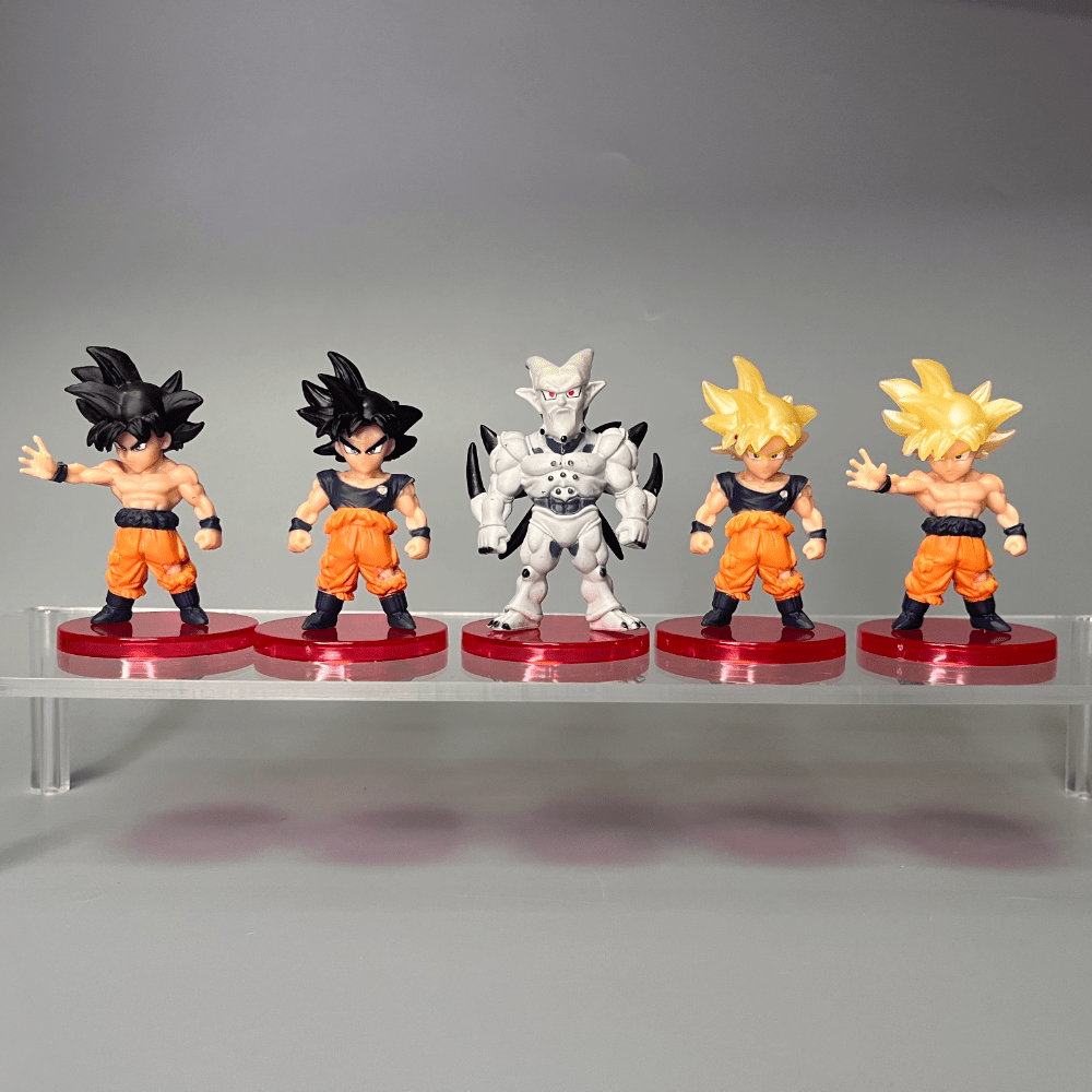 21 figuras de personajes populares del anime, incluyendo a los héroes Saiyan como Bulma, Vegeta y Piccolo, Frieza. Recibe 1 pieza al azar para decoración de escritorio