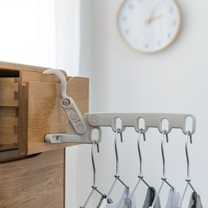 1 gancho plegable para ropa con 5 ganchos ergonómicos - Colgador portátil, ahorrador de espacio y duradero para viajes, hoteles, residencias y uso en interiores, colgadores para ropa, esenciales para dormitorios, diseño multigancho, opciones versátiles d