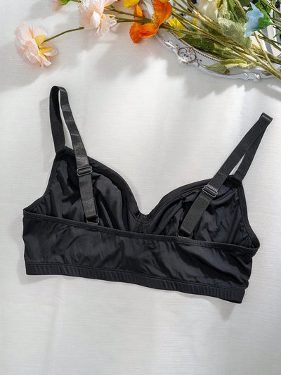 Romantico sujetador negro con tirantes delgados y sin relleno en el pecho