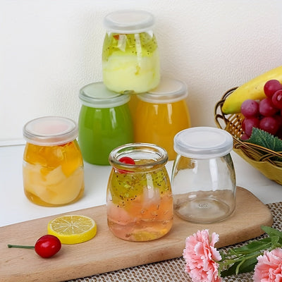 10pcs Tarros de Vidrio Transparentes de 4oz con Tapas de PE - Perfectos para Yogur, Pudín, Leche, Mermelada, Gelatina, Mousse y Miel - Contenedores Redondos Reutilizables para Almacenamiento en la Cocina del Hogar