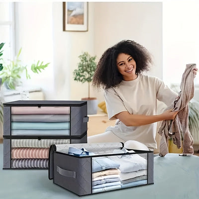 Una bolsa de almacenamiento de ventana plegable de PVC, con 3 capas de tejido no tejido, una caja de almacenamiento transparente para ropa y mantas, en gris, con un diseño minimalista y cierre con cremallera, adecuada para el transporte diario y el movim