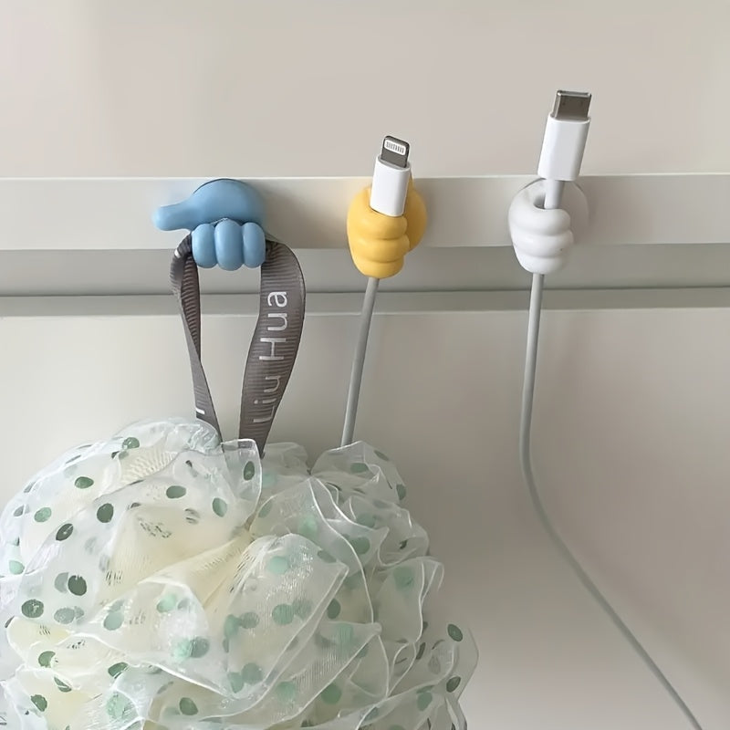 Conjunto de 5 Organizadores de Cables en Forma de Pulgar - Ganchos Adhesivos Sin Taladro para Hogar, Cocina y Dormitorio, Colores Surtidos (Amarillo, Azul, Blanco, Verde), Material Plástico, Ideal para Cargadores y Pequeños Accesorios, Soporte para Cuerd
