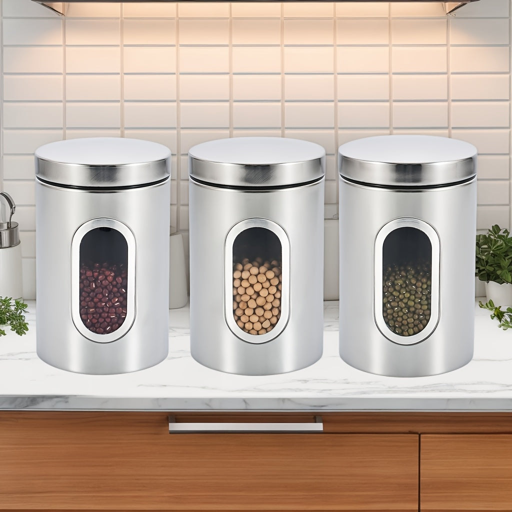 Tarros de Almacenamiento para Cocina, 3 Piezas en Acero Inoxidable con Ventana Transparente - Ideales para Café, Té y Granos - Organizador Redondo Reutilizable con Tapas Abatibles | Solución de Almacenaje Moderna | Utensilios de Cocina Duraderos
