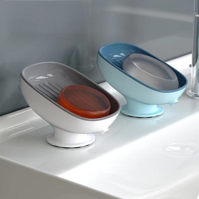 El recipiente de jabón cuenta con agujeros de drenaje y un diseño de succión para uso en el hogar, evitando la acumulación de agua. Es una adición minimalista y creativamente lujosa para baños.