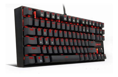Teclado Redragon Kumara QWERTY Outemu Blue español latinoamérica color negro con luz RGB