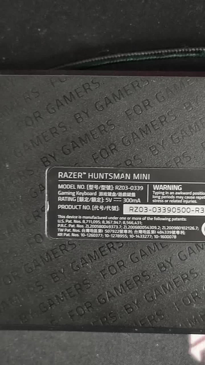 Teclado gamer Razer Huntsman Mini QWERTY Razer Purple inglés US color negro con luz RGB