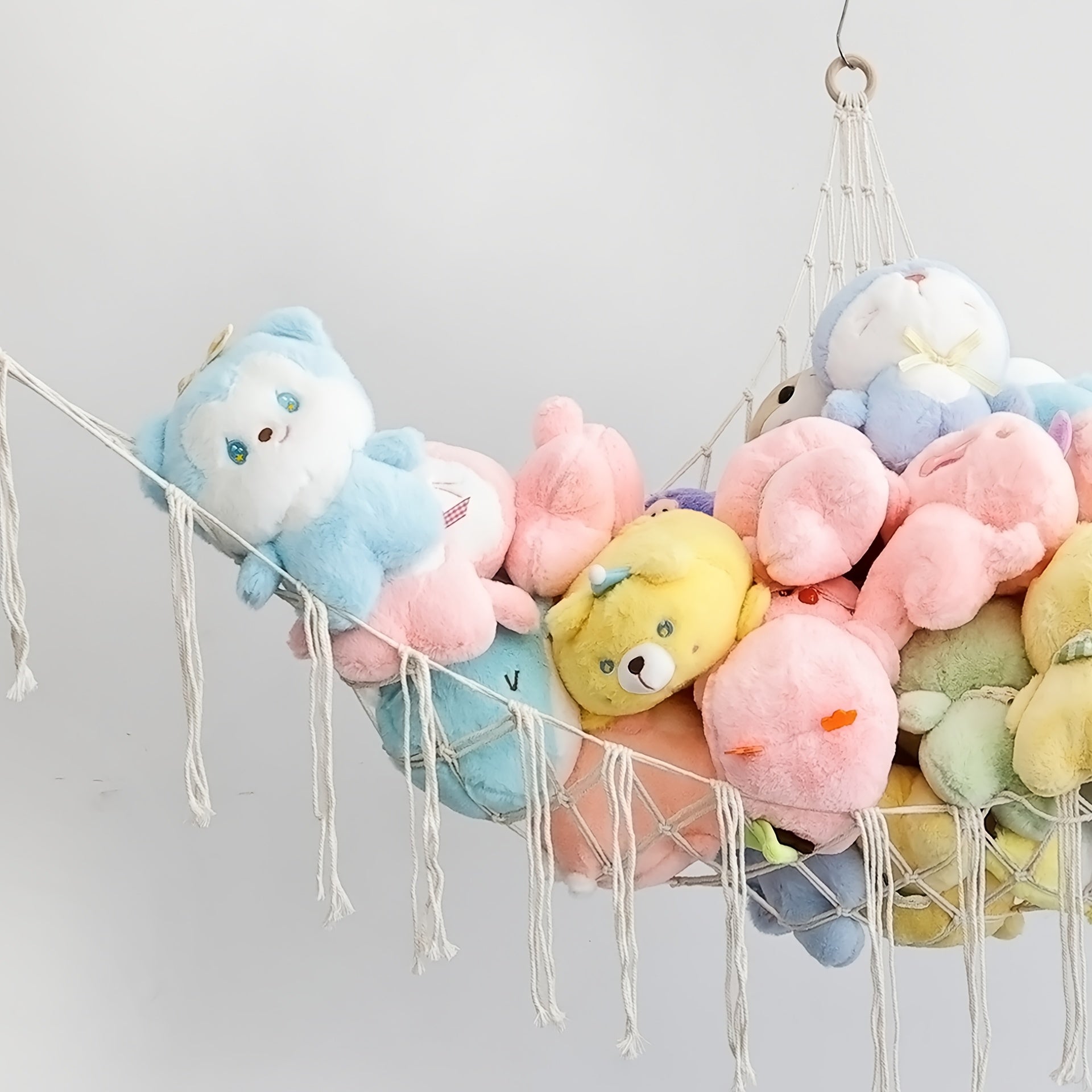 Hamaca colgante de almacenamiento tejida a mano con cuerda de peluche para juguetes de pedestal