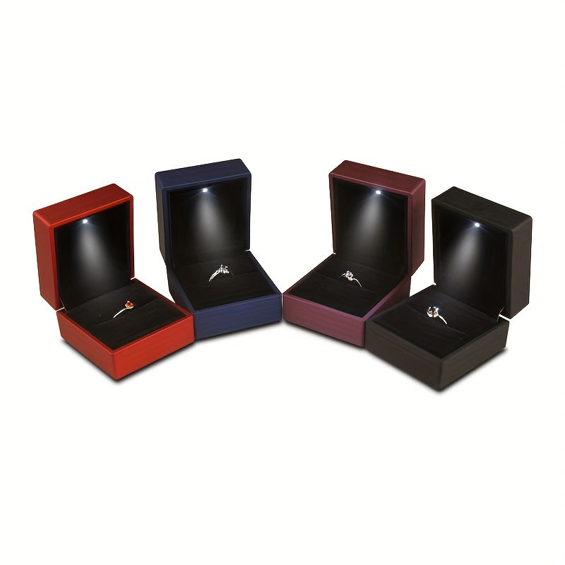 1 caja de anillos moderna con luz LED alimentada por batería, estuche para joyas con brillo suave para alianzas y bodas, 6x5x2 cm, plástico duradero, 4 colores (rojo/azul//gris), iluminación elegante para exhibición de anillos | Estuche decorativo interi