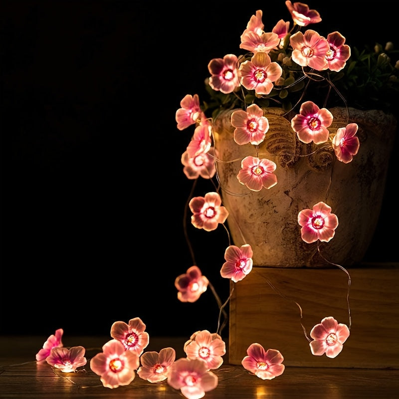 Una cadena de luces en forma de flor de cerezo de 20 luces LED, luces de flores rosadas, cadena de luces decorativas para dormitorio rosa, luces decorativas festivas para dormitorio con un toque femenino, de 2 metros de largo, con 20 luces (baterías no i