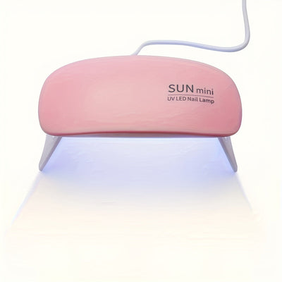 Lámpara de uñas portátil mini con 6 luces LED, color rosa y blanco, alimentación USB, diseño plegable, ideal para esmaltado en gel y secado, perfecta para cuidado de manos, pies y uñas