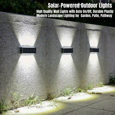 Juego de 2 luces solares para exteriores con 16 LEDs, ideales para mejorar patios y paredes. Estas luces decorativas de paisaje mejoran el ambiente con la capacidad de lavado de paredes en dos direcciones, perfectas para decorar balcones de verano. Clasi