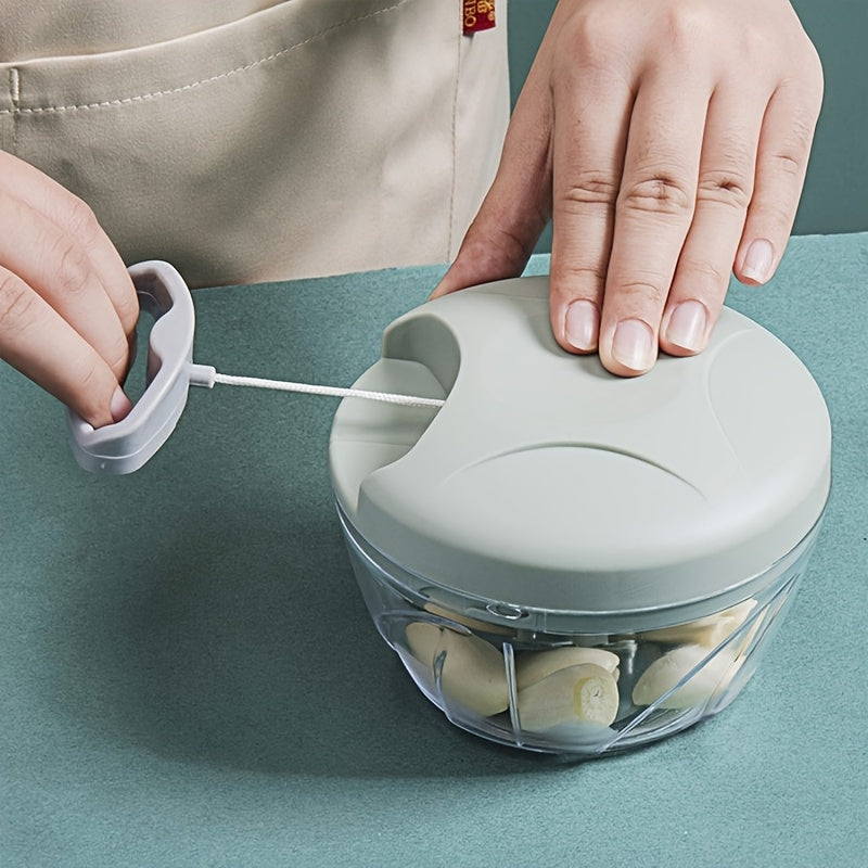 Un procesador de alimentos manual multifuncional - picadora de alimentos manual, procesador de cocina manual, cortador adecuado para verduras, carne, frutas, nueces, ajo, cebolla, fabricante de ensaladas de chile - una herramienta de cocina eficiente