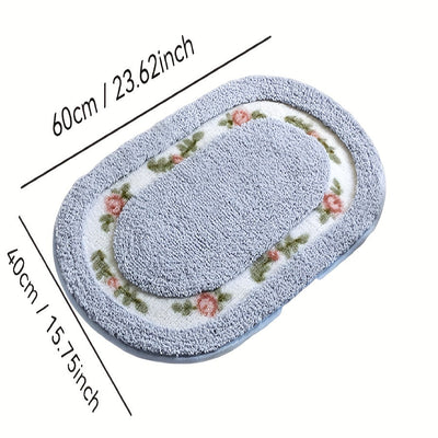 Una alfombra ovalada en la entrada, una alfombra junto a la cama cerca de la ventana salediza, una alfombra antideslizante para el baño y una alfombra absorbente para el cuarto de baño.